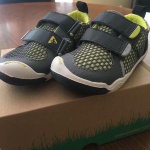 Brand new, never worn boys Plae shoes.