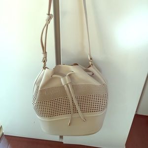 Ivory Zara faux leather bucket bag