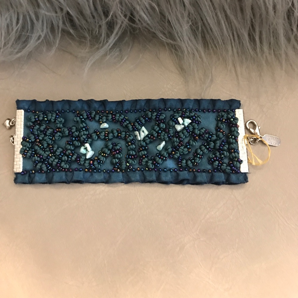 Stone bracelet on satin