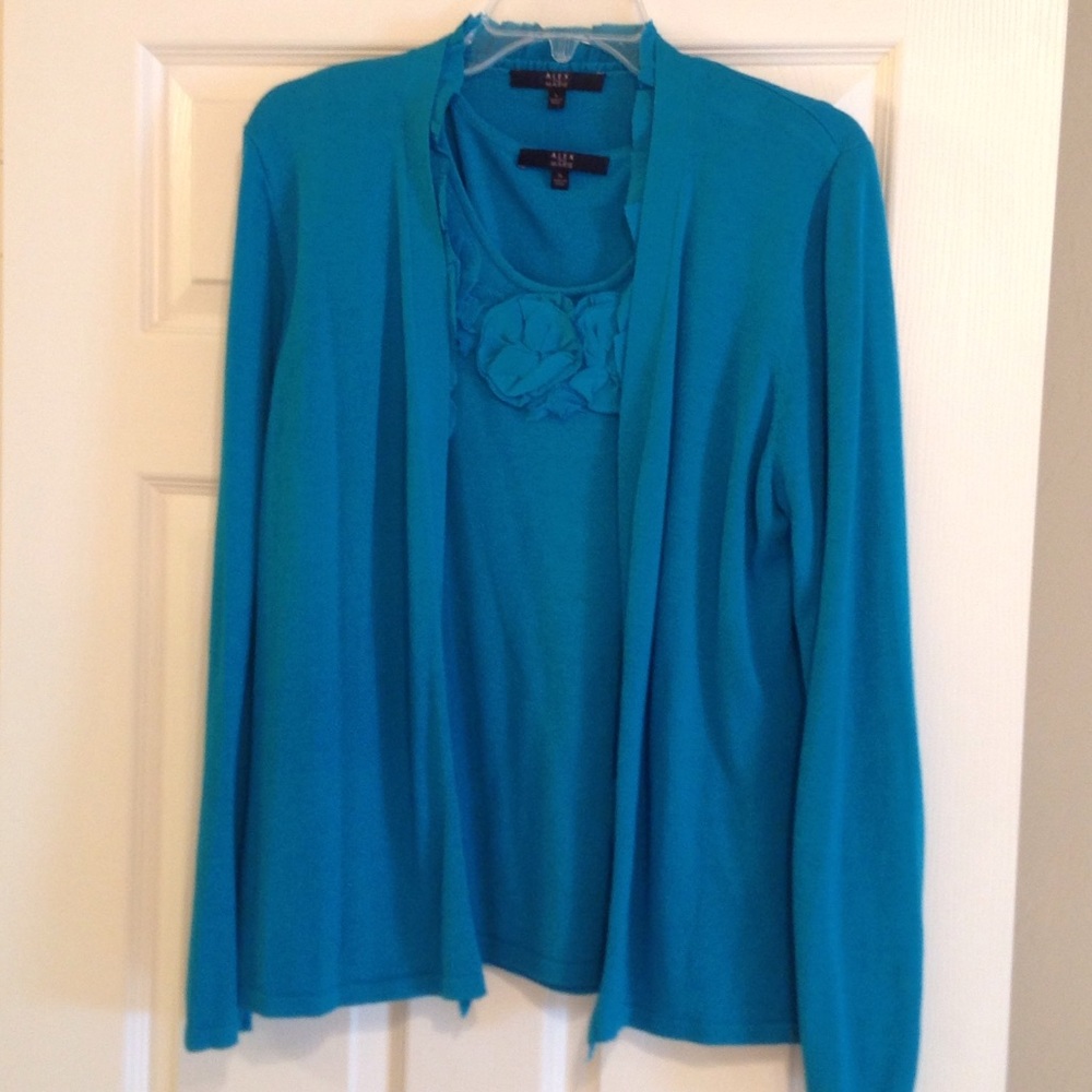 Teal knit cardigan with silk ruffle detail