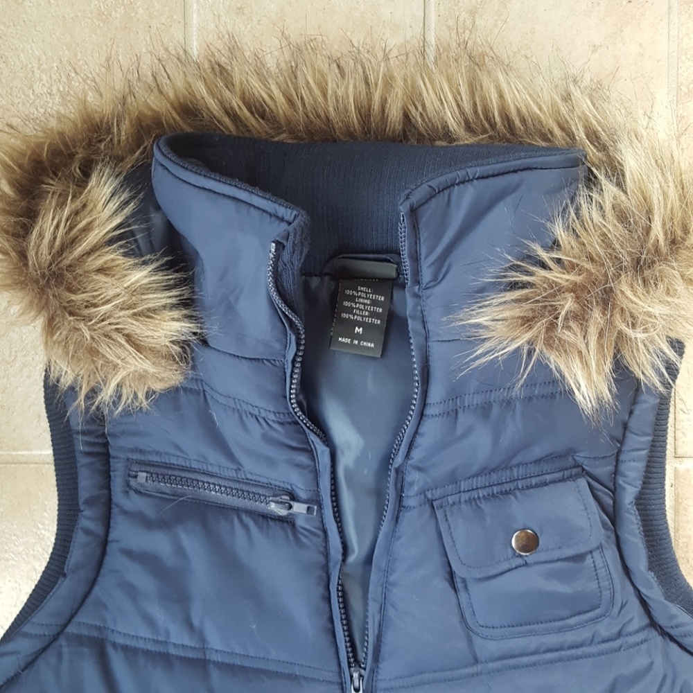 NEVER WORN navy vest with fur hood.