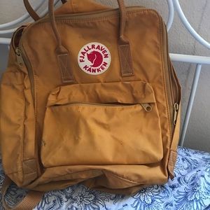 kanken mustard backpack