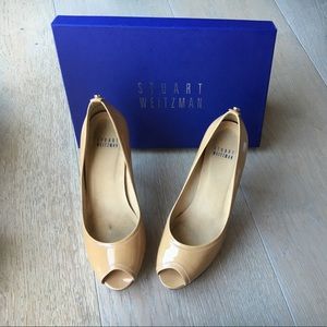 Stuart Weitzman nude peep toe pumps