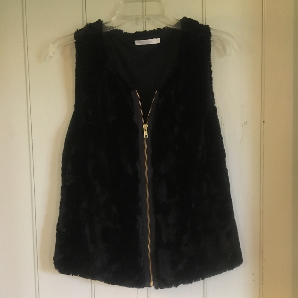 Cozy and stylish faux fur vest!