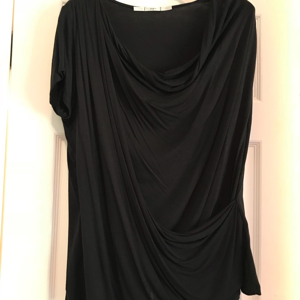 Beautiful new w/o tags cross fold blouse