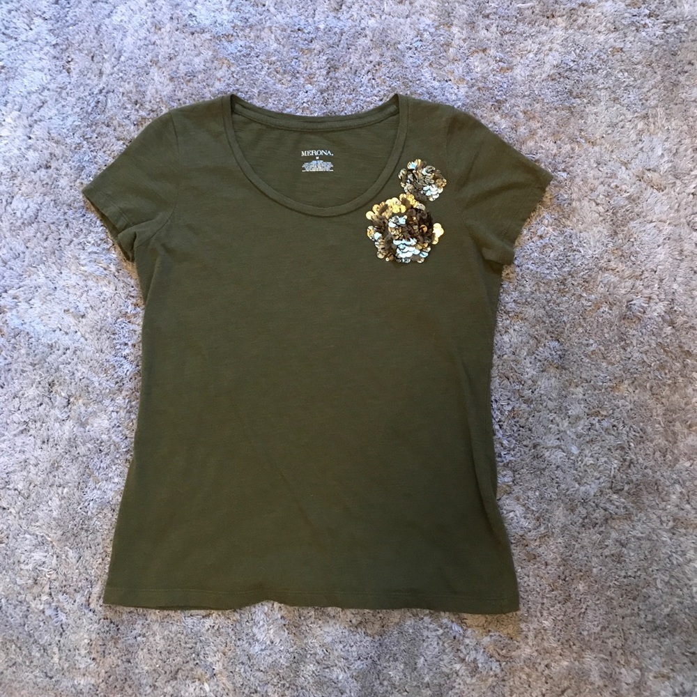 Green shirt with gold flower embellishment