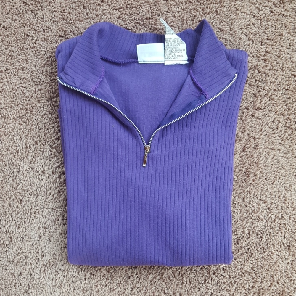 Quarter length zip up pull over.