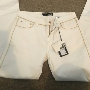 White jeans with gold trim