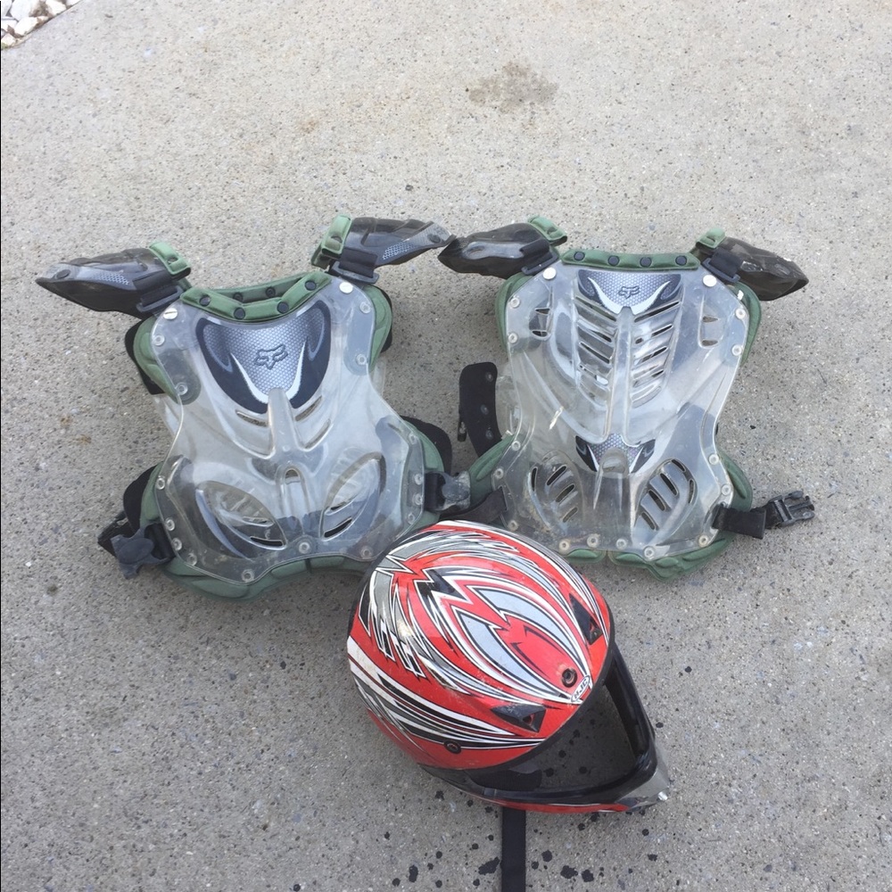 Two FOX chest protectors and helmet