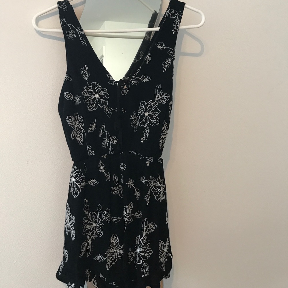 Black & white ruffle romper