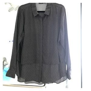 Long sleeve button up blouse.