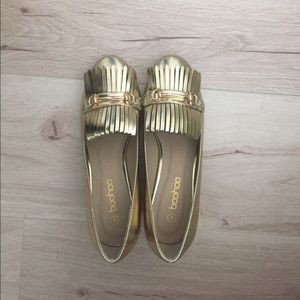 Gold loafers