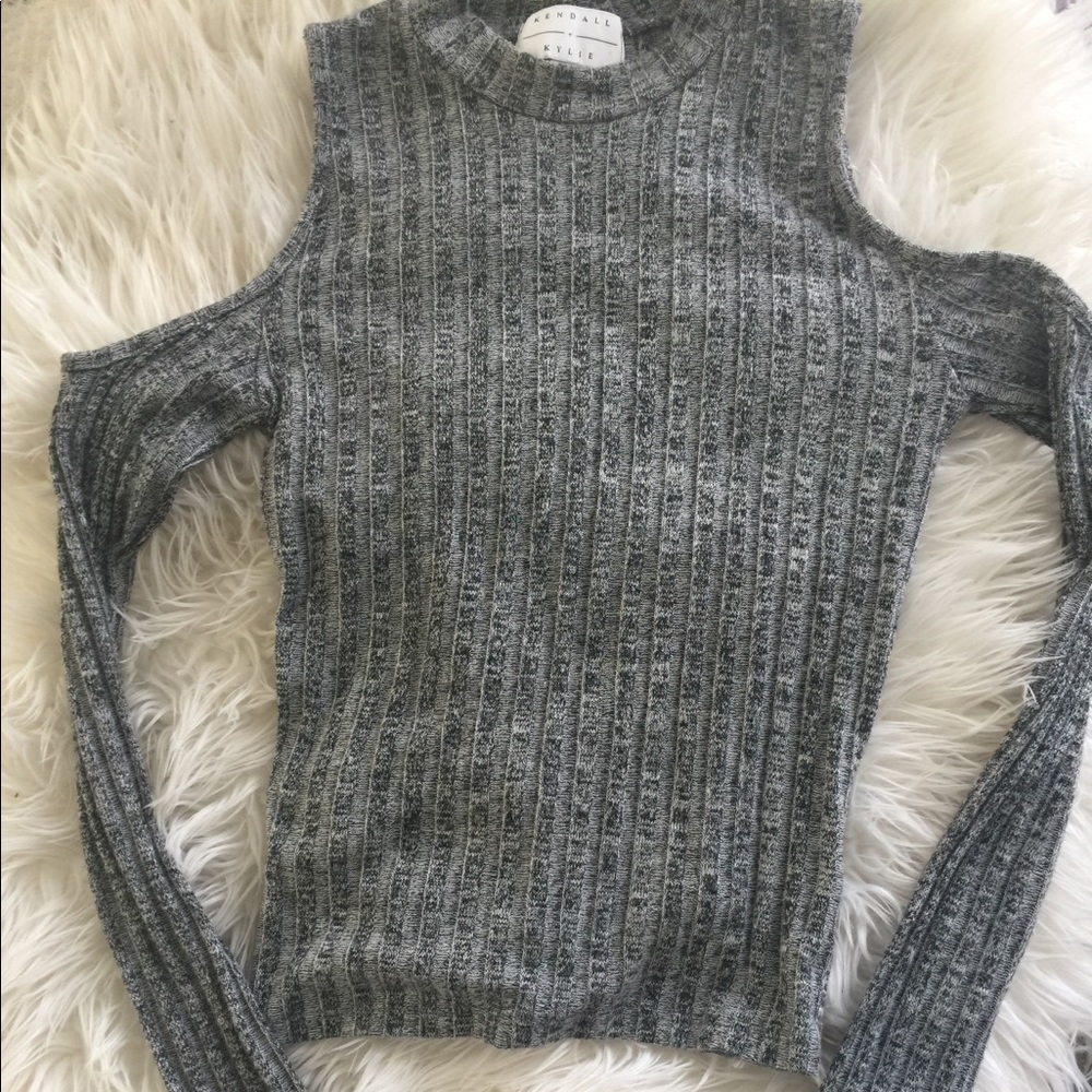 Cold shoulder, long sleeved sweater