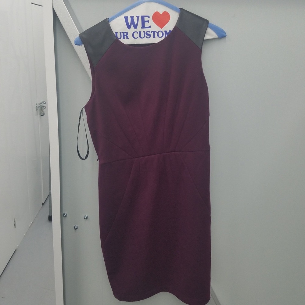 Ivanka Trump Burgundy dress with leather shoulder