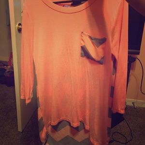 A pink and gray Chevron shirt