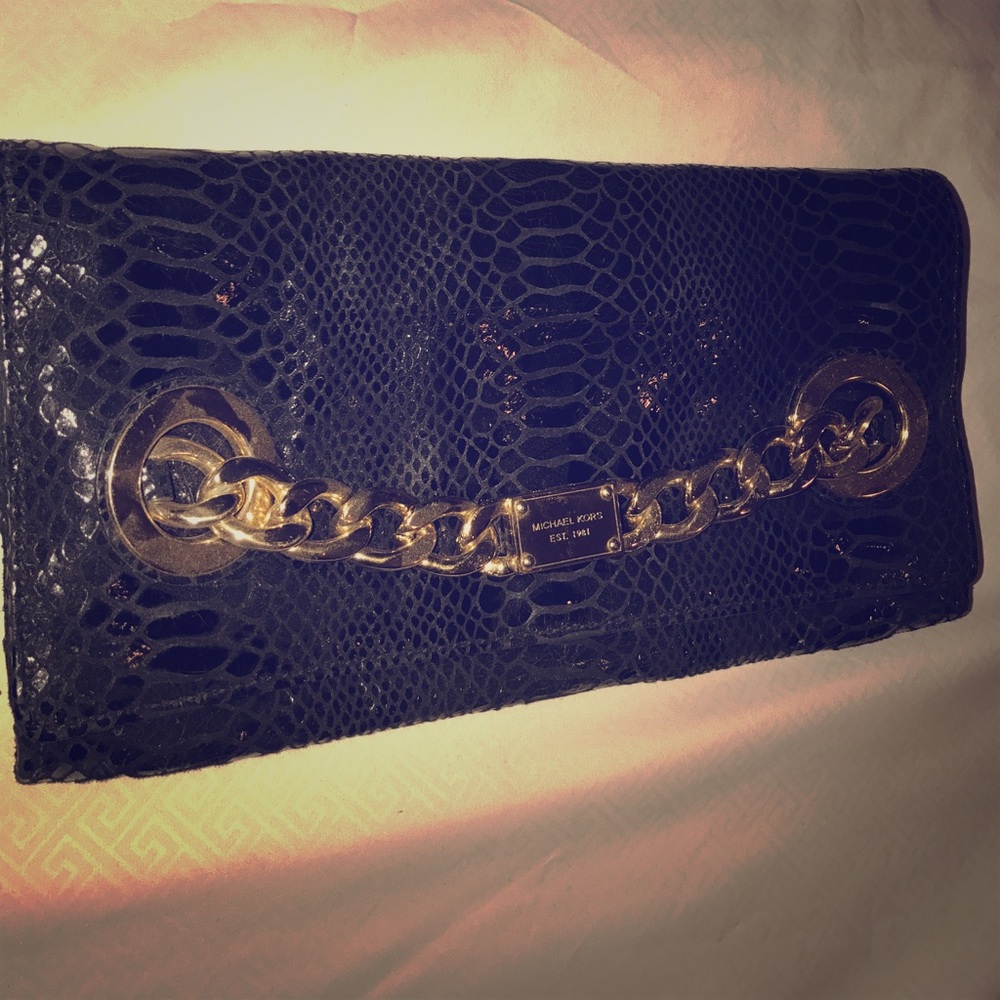 Snakeskin MK clutch