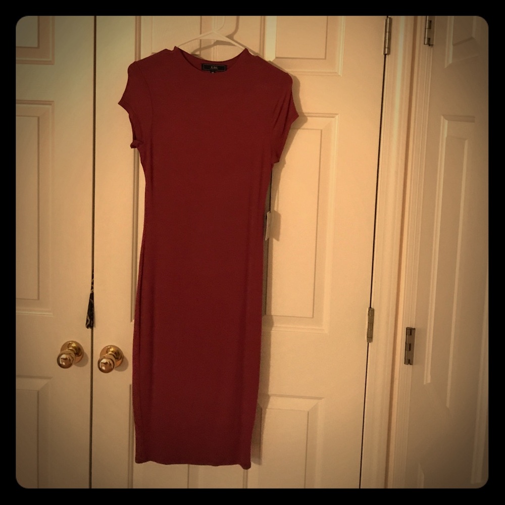 Knee length jersey knit dress. New with tags.