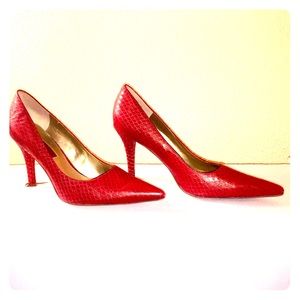 Red snakeskin heels