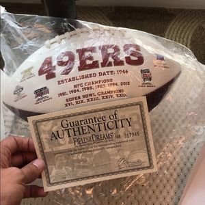 Autographed and authenticated football Jerry Rice