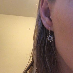 Gold star shaped diamond earrings