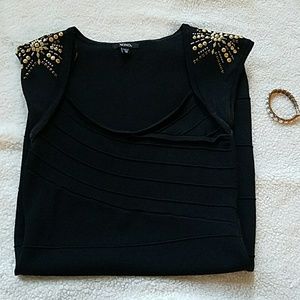 Form-fitting black dress
