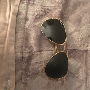 Black gold ray ban aviators