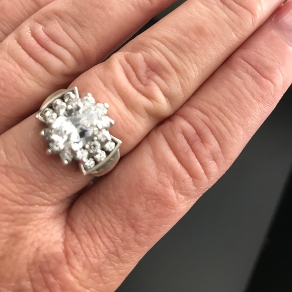 Cubic zirconia ring set in sterling silver.  Sz 7 - Picture 1 of 6