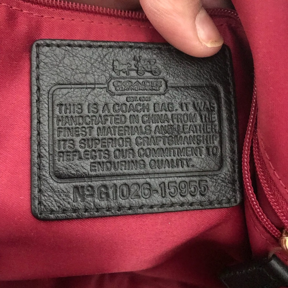 Coach black and gold purse