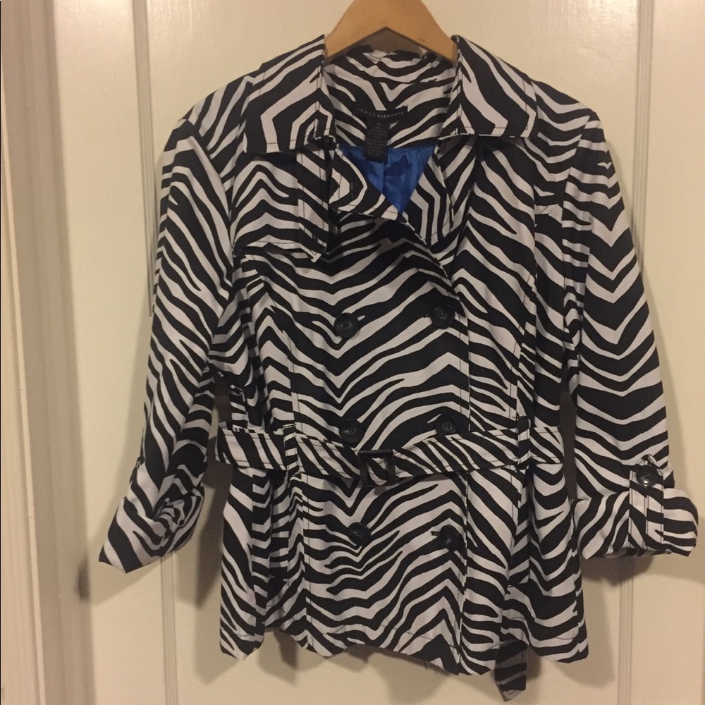 Zebra print rain coat. New with tags and belt.