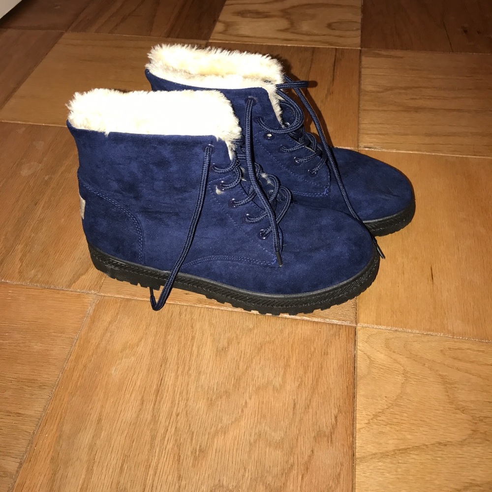 Navy boots with faux fur interior
