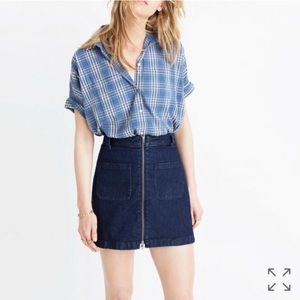 Madewell front zip mini denim skirt.