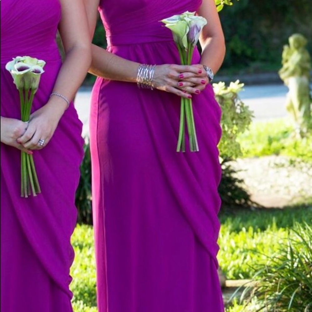 A raspberry color dress.