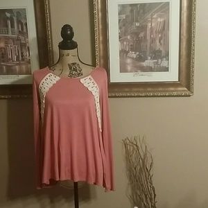 Blouse braided in back.