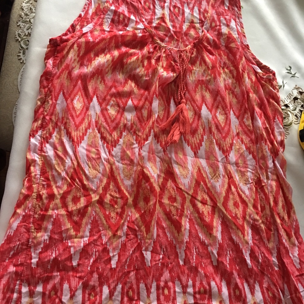 Red sleeveless top