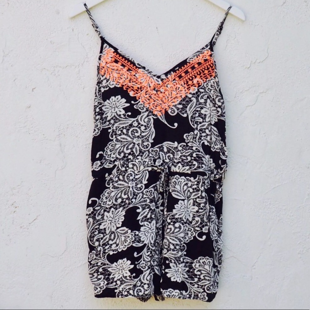 Black and White romper, very cute!! Size M