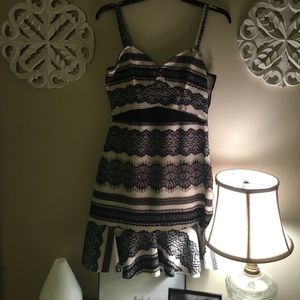 Black and cream colored dress