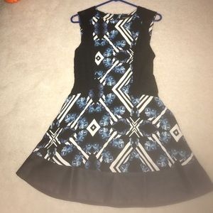 Pattern dress with leather trim Pattern dress with leather trim