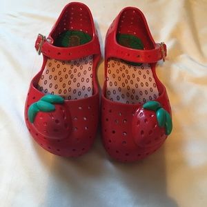 Adorable mini Melissa red shoes for toddler girl