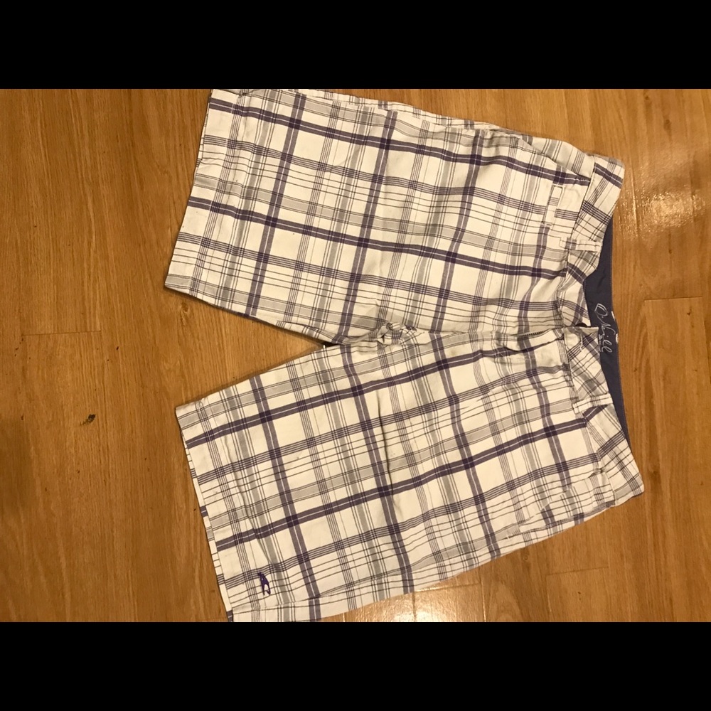Plaid white and purple shorts.