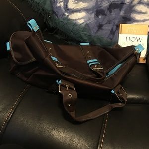 Brown and turquoise overnight/gym bag.