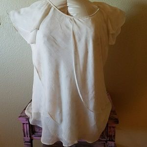 Cream colored flutter sleeve chiffon blouse