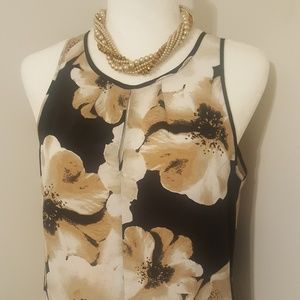 Mixed print top with cute keyhole