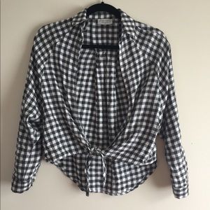 Black and white front tie collared shirt.