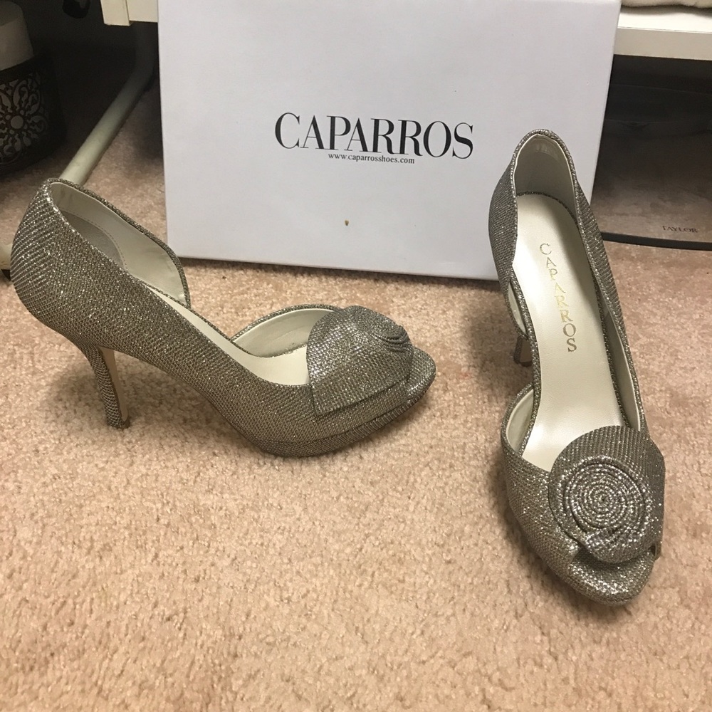 Sz 7 1/2 worn once for a wedding so not much :)