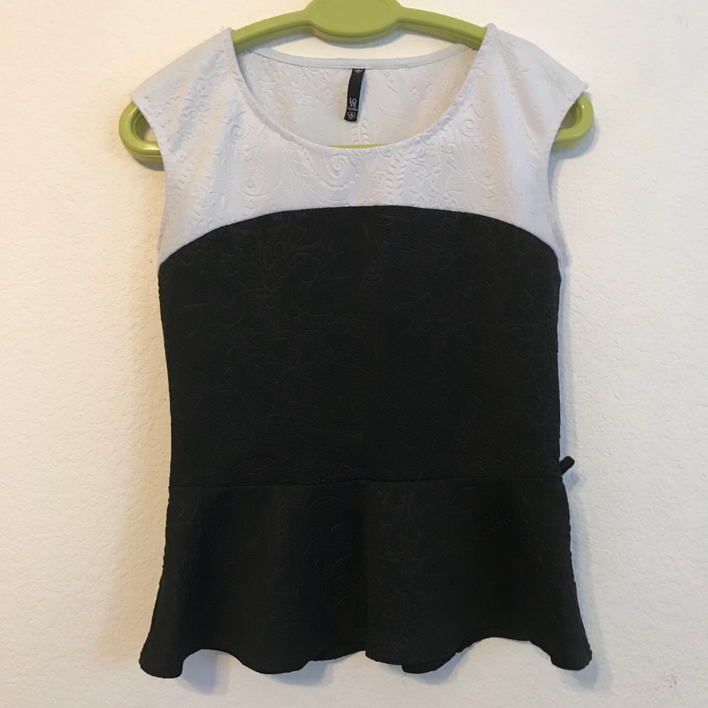 Black and white peplum top with floral designed