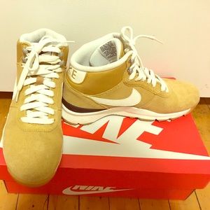 Nike shoes yellow with white logo