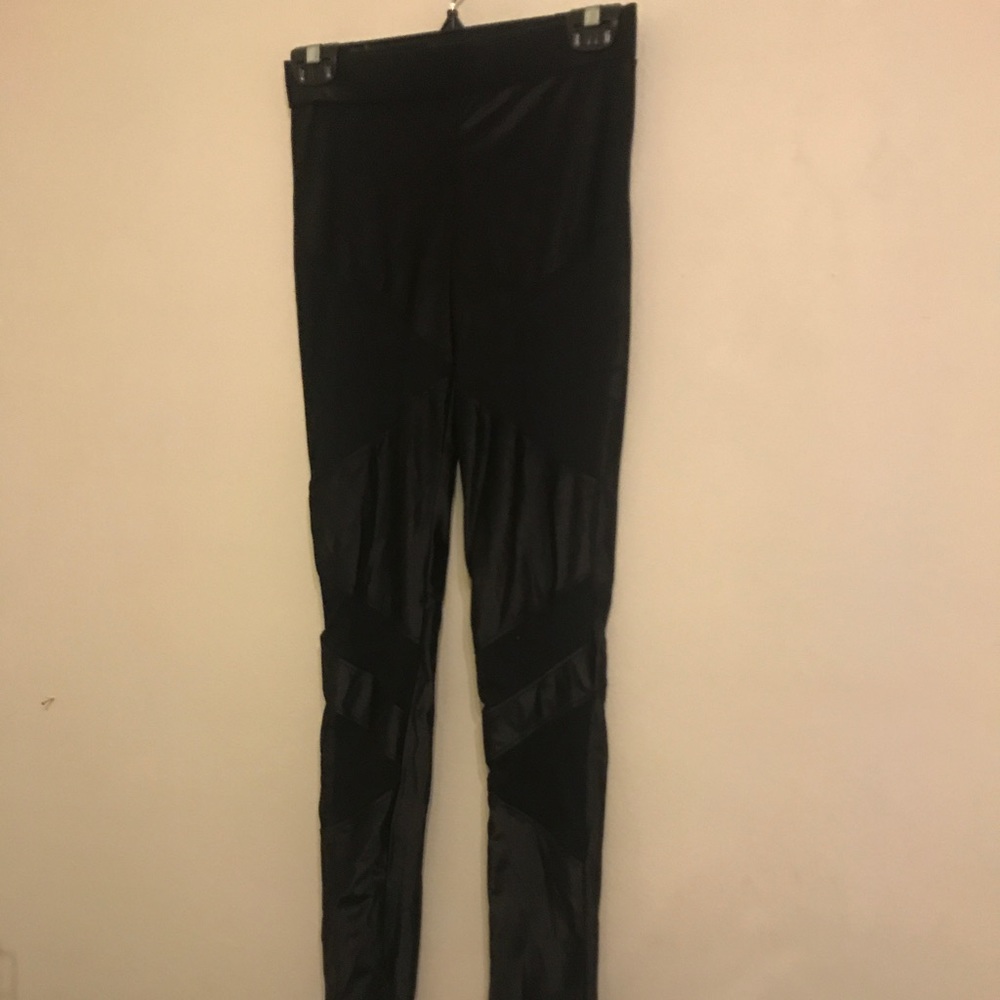 Black leggings with mesh inserts
