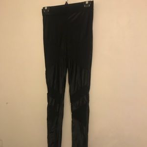 Black leggings with mesh inserts