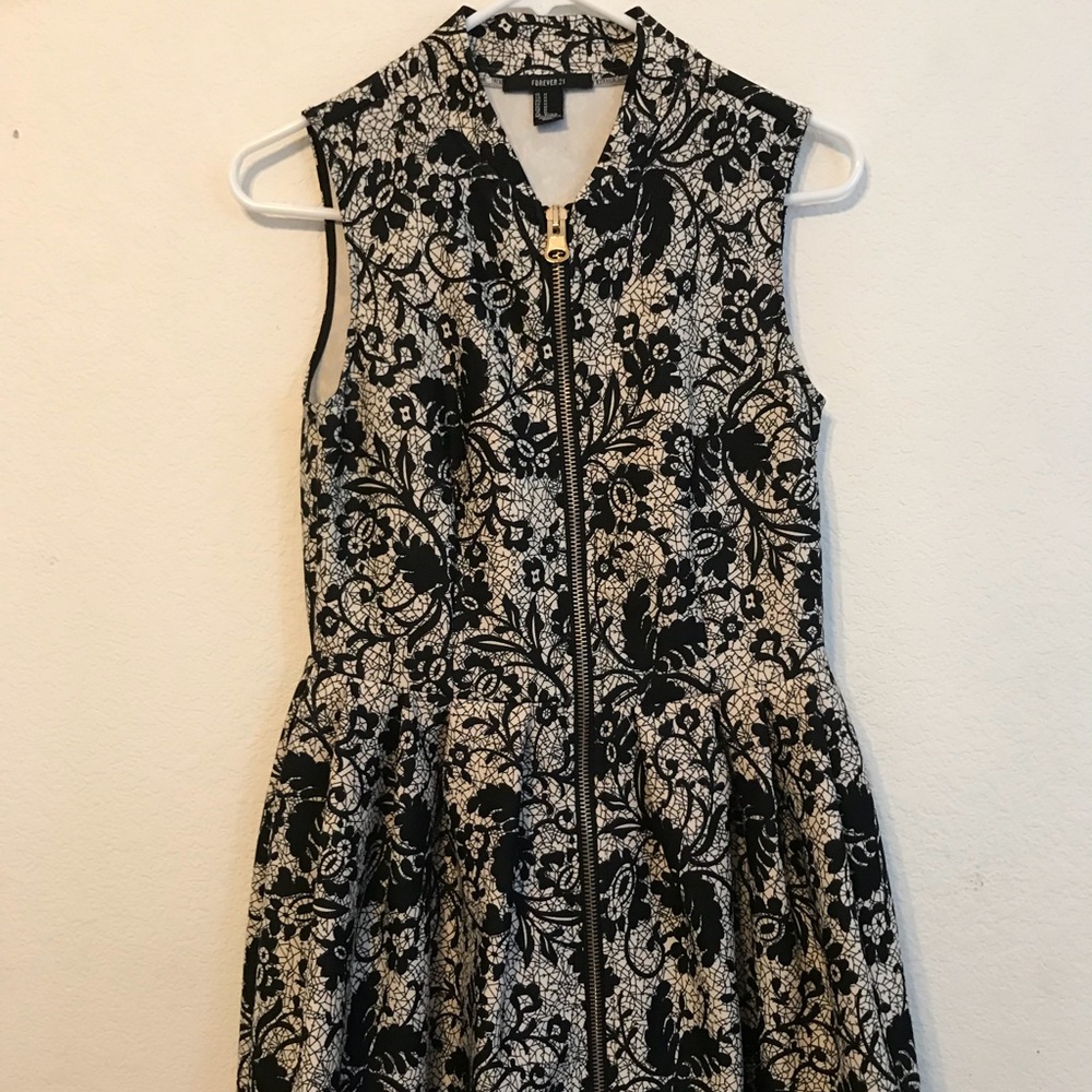 Cute zip down black and white dress with floral
