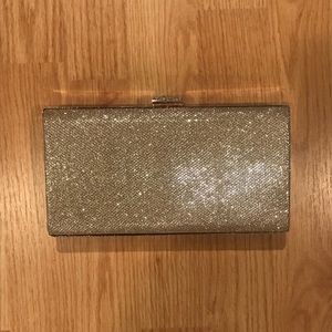bebe gold clutch